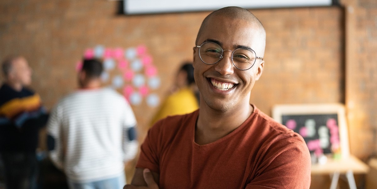 smiling man in office