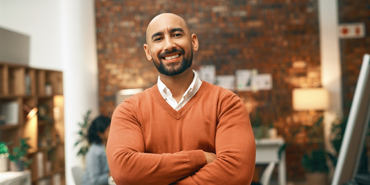 professional man in office smiling